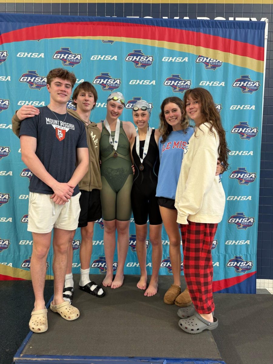 Swim team ends season with historic state meet performance