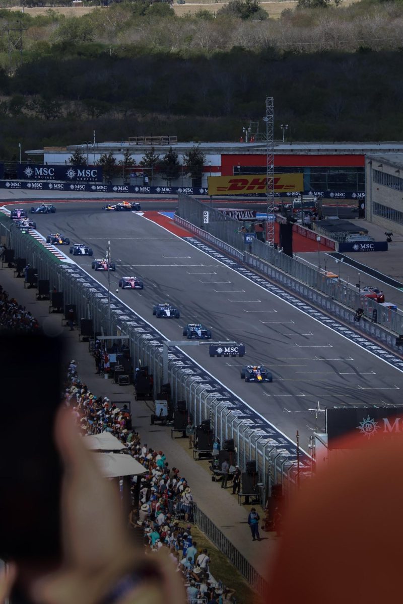 Red Bull driver Max Verstappen leads a tight pack in the sprint moments before the green flag.
